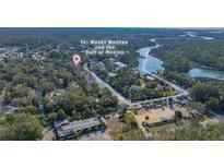 Aerial view showing home's location on canal with access to Weeki Wachee and the Gulf of Mexico at 6119 Beacon Point Dr, Weeki Wachee, FL 34607