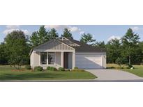 Charming one-story home featuring a gray exterior, manicured lawn, and attached two-car garage at 7529 E 116Th St, Palmetto, FL 34221