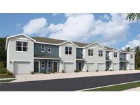 New townhomes showcase a two-story design, garages, neutral colors, and a walkway at 2748 Newbern Banks Dr, Bradenton, FL 34208