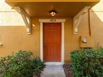 Close-up of the home's entry with covered porch and address clearly displayed at 4734 Chatterton Way, Riverview, FL 33578