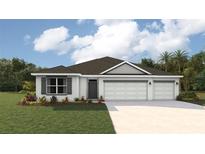 Charming single-story home with three-car garage and manicured front yard at 17464 Whiskey Creek Trl, Parrish, FL 34219