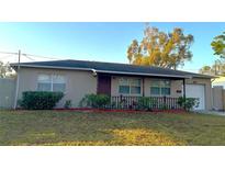 Charming single-story home with a well-maintained front yard and inviting front porch at 4790 81St N Ave, Pinellas Park, FL 33781