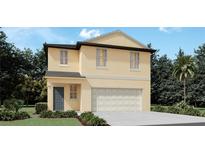 This is a charming two-story home with an attached two-car garage, complemented by lush landscaping and a well-maintained lawn at 13567 Newbridge St, Spring Hill, FL 34609
