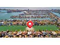 Waterfront homes along the canals, perfect for boating and enjoying coastal living in a vibrant community at 11320 8Th E St, Treasure Island, FL 33706