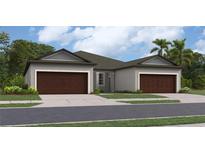 Charming paired villa with a well-manicured lawn and a two-car garage at 12649 Lily Quartz Loop, Parrish, FL 34219