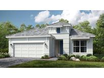 Charming single-story home featuring a two-car garage, manicured lawn, and welcoming front entry at 8092 Moonbeam Ave, Sarasota, FL 34241