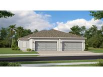 Charming single-story home featuring a two-car garage and pristine landscaping at 8604 Seasalt Loop, Englewood, FL 34224