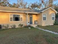 Charming single-story home with a front yard and welcoming entrance at 2301 46Th S St, St Petersburg, FL 33711