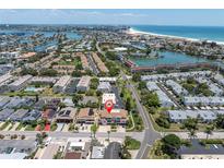 Beautiful aerial view of property, showcasing beach access, and picturesque community at 219 126Th Ave, Treasure Island, FL 33706