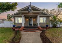 Charming single-Gathering home with a quaint front porch and detailed trim work at 1924 W Carmen St, Tampa, FL 33606