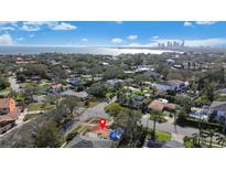 Aerial view of a home in a waterfront community near downtown, lush landscaping, beautiful waterfront views at 601 Cordova Ne Blvd, St Petersburg, FL 33704