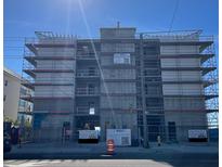 Multi-story building under construction with scaffolding at 14046 Gulf Blvd # 1, Madeira Beach, FL 33708