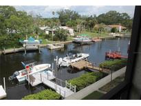 Scenic view of boats docked along a canal at 8210 Aquila St # 223, Port Richey, FL 34668
