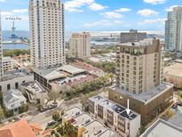 Aerial view of a modern townhome community near the water at 106 Fareham N Pl, St Petersburg, FL 33701