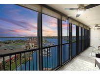 Spacious condo balcony boasting stunning sunset and waterfront views at 10355 Paradise Blvd # 1010-1011, St Petersburg, FL 33706