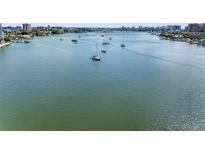 Aerial view of waterfront homes and boats at 660 Island Way # 401, Clearwater, FL 33767