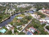 Aerial view showing home's location near water at 6417 River Rd, New Port Richey, FL 34652