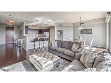 Contemporary living area featuring hardwood floors, open layout, and stylish furnishings at 8255 Las Vegas Blvd # 1819, Las Vegas, NV 89123