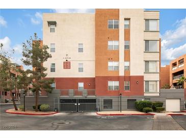 Three-story building with multiple units and parking at 31 E Agate Ave # 205, Las Vegas, NV 89123