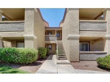 Attractive building exterior with stairs and landscaping at 2300 E Silverado Ranch Blvd # 1094, Las Vegas, NV 89183