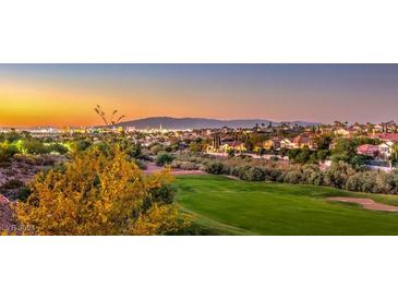 Luxury homes and golf course at sunset at 2994 San Lorenzo Ct, Henderson, NV 89052