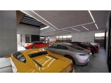 Showcasing a modern garage featuring an array of luxury sports cars and sleek, contemporary lighting at 491 Cityview Ridge Dr, Henderson, NV 89012