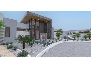 Contemporary home featuring a water feature, desert landscaping, and an inviting entryway at 1487 Reims Dr, Henderson, NV 89012