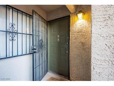 Inviting condo entry with a security screen door at 3790 Shirebrook Dr # 98, Las Vegas, NV 89115