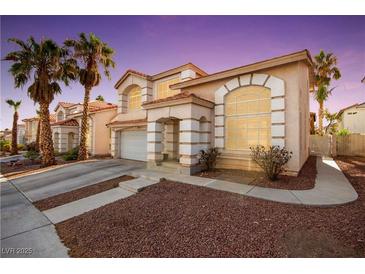 Charming two-story home featuring desert landscaping, a two car garage, and classic architecture at 8737 Autumn Valley Ave, Las Vegas, NV 89129