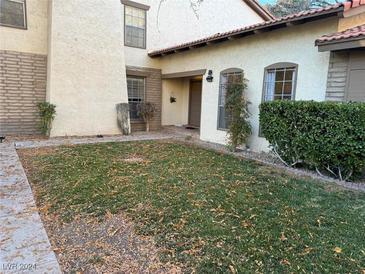 Charming single-story home featuring a well-manicured lawn and inviting entrance at 3077 Pinehurst Dr # A, Las Vegas, NV 89109