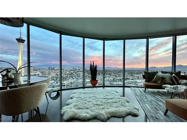 Luxury living room boasts stunning panoramic city views at 322 Karen Ave # 2007, Las Vegas, NV 89109