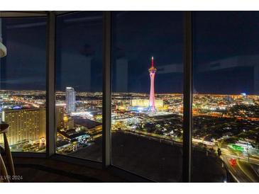 Stunning panoramic city view at night showcased through expansive windows at 322 Karen Ave # 3707, Las Vegas, NV 89109