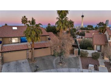 Aerial view of a residential home with a desert landscape at 2205 Alia Ct, Las Vegas, NV 89102