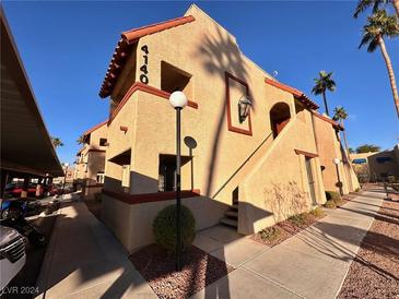 Building exterior with stairs and landscaping at 4140 Gannet Cir # 251, Las Vegas, NV 89103
