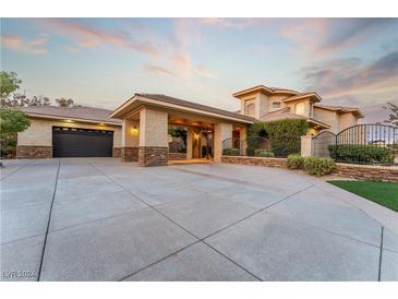Luxury home with large motor court and gated entry at 2870 Quartz Canyon Dr, Henderson, NV 89052