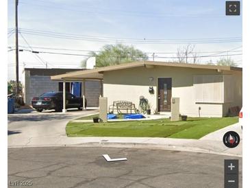 Ranch style home with carport and small front yard at 5217 Chesapeake Cir, Las Vegas, NV 89108