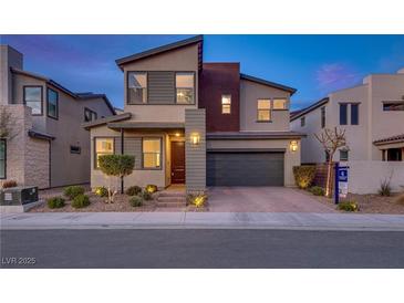 Modern two-story home with attached garage and landscaped front yard at 540 Front Range Ln, North Las Vegas, NV 89084