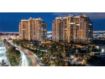 Luxury high-rise building at night with city views at 9101 Alta Dr # 307, Las Vegas, NV 89145