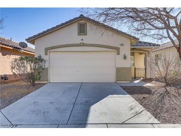 One-story house with attached garage and landscaping at 8139 Azure Falls Ct, Las Vegas, NV 89117