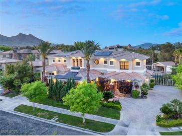 Luxury home with solar panels, pool, and mountain views at 10308 Rocky Mesa Ct, Las Vegas, NV 89144