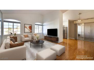 Bright living room featuring lots of natural light and an open floor plan at 1830 N Buffalo Dr # 2095, Las Vegas, NV 89128