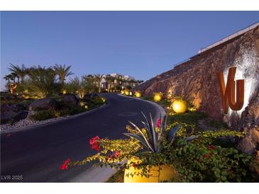 Luxurious community entrance with attractive landscaping and modern design at 371 Tranquil Peak Ct, Henderson, NV 89012