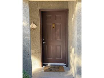 Inviting condo entry with brown door and welcoming mat at 9000 Las Vegas Blvd # 1013, Las Vegas, NV 89123