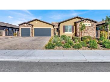 Beautiful single-story home with three-car garage and well-manicured landscaping at 7036 Winstar St # A, Las Vegas, NV 89131