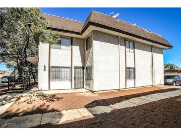 Two story building exterior with parking and landscaping at 4348 Tara Ave # 2, Las Vegas, NV 89102