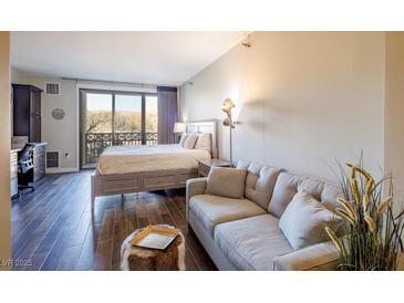 Bright bedroom with a king-size bed, and a view at 29 Montelago Blvd # 317, Henderson, NV 89011