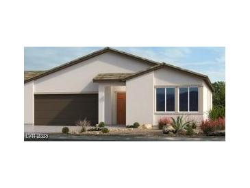 Single-story home with brown garage door and light-colored exterior at 4420 E Brusca Way, Pahrump, NV 89061