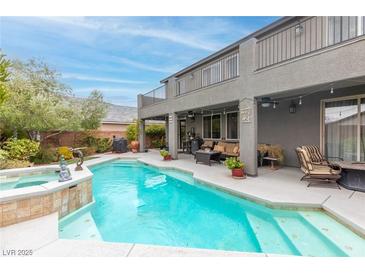 Inviting backyard pool and spa with patio at 7306 Puckershire St, Las Vegas, NV 89166