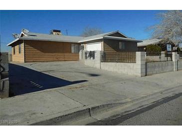 Ranch style home with a large yard and driveway at 5175 Orinda Ave, Las Vegas, NV 89120