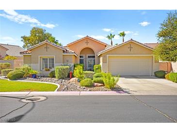 Single-story house with desert landscaping and a two-car garage at 2869 Matese Dr, Henderson, NV 89052